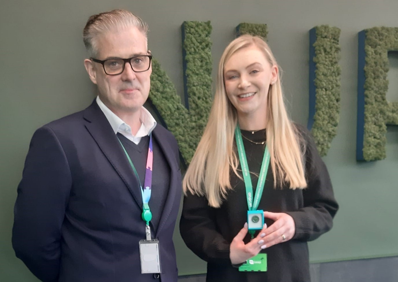 Garrett Bridgeman, Managing Director - APC, presents Aoife with her VIP pin